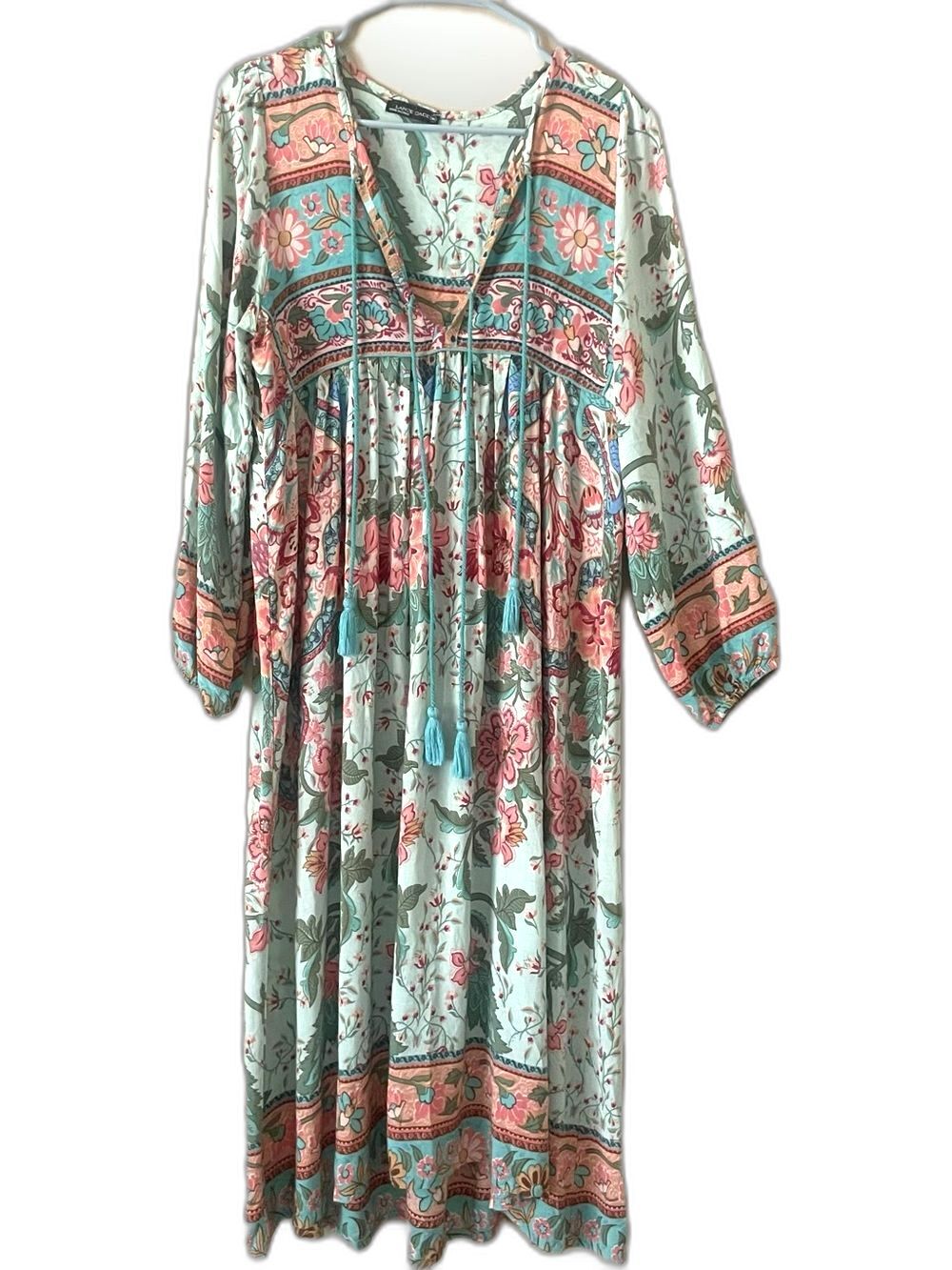 This Lance Cade long-sleeve bohemian long dress in light turquoise. Size medium